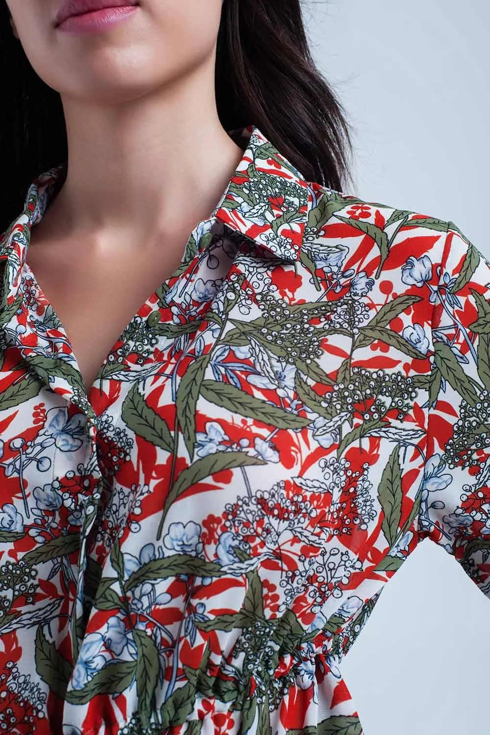 Red shirt with leaf and flower print